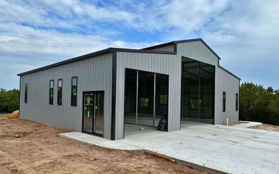 Lelands grey metal barndominium